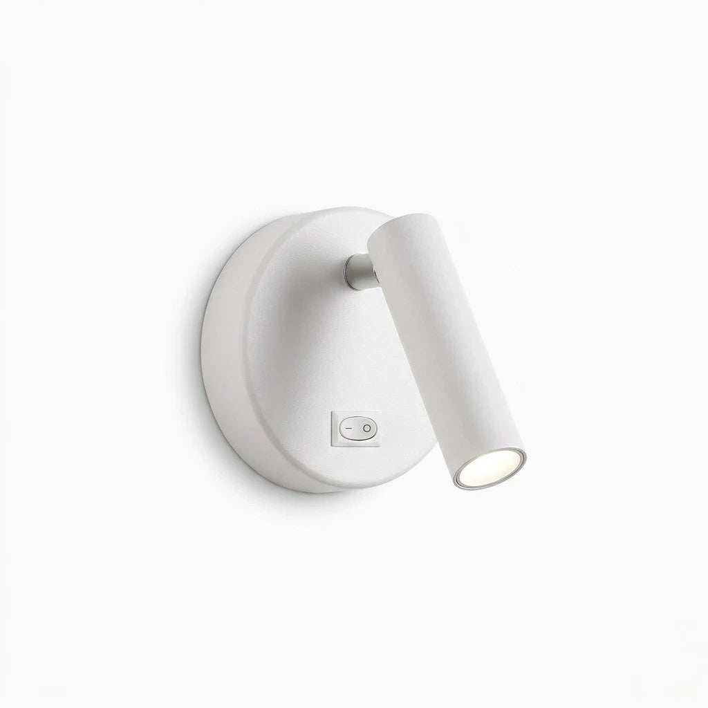 Applique blanche fixée au mur au-dessus d'un lit avec commande d'interrupteur tactile