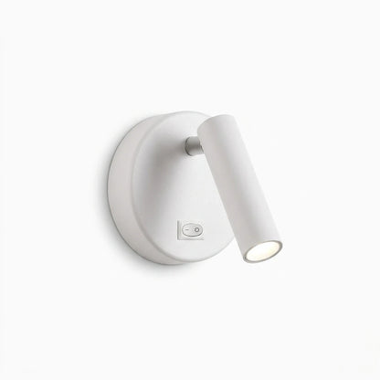 Applique blanche fixée au mur au-dessus d'un lit avec commande d'interrupteur tactile