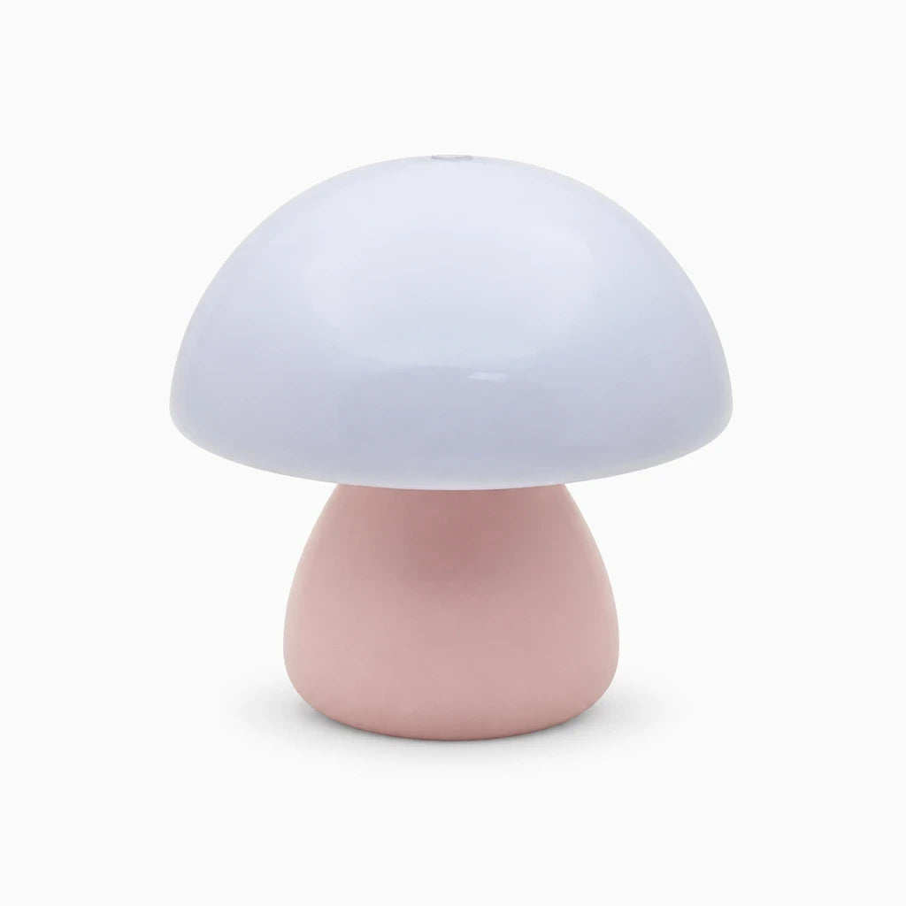 Champignon veilleuse rose avec socle compact sur table de chevet, contrôle tactile rechargeable