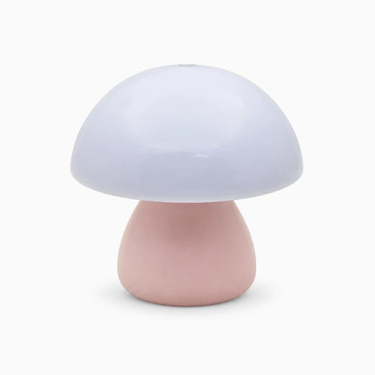 Champignon veilleuse rose avec socle compact sur table de chevet, contrôle tactile rechargeable