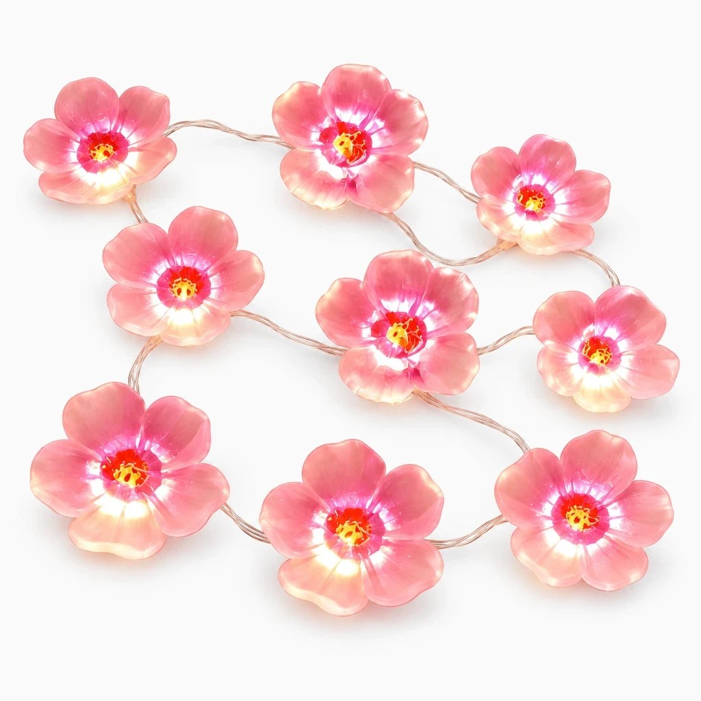 Guirlande lumineuse fleur avec petites fleurs roses sur fil LED et lumière chaude