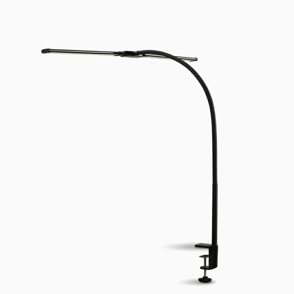 Lampe architecte compacte noire avec bras orientable et commandes de contrôle lumineux