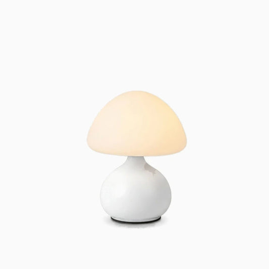Lampe de chevet blanc avec abat-jour arrondi en forme de champignon sur table de nuit