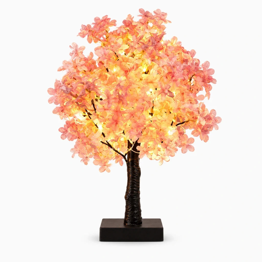 Veilleuse rose en céramique avec silhouette de pétale pour décoration discrète