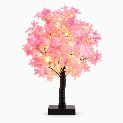Lampe de nuit rose produisant un éclairage doux adapté au repos et à la détente
