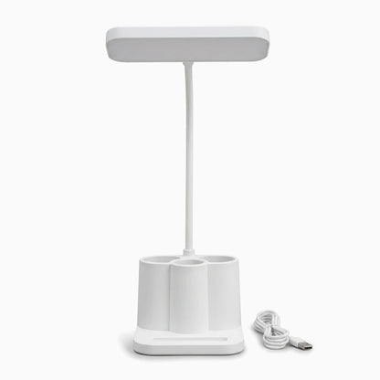 Lampe sur usb compacte avec trois teintes réglables, posée sur un bureau de travail