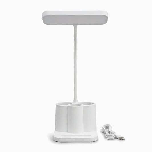 Lampe sur usb compacte avec trois teintes réglables, posée sur un bureau de travail