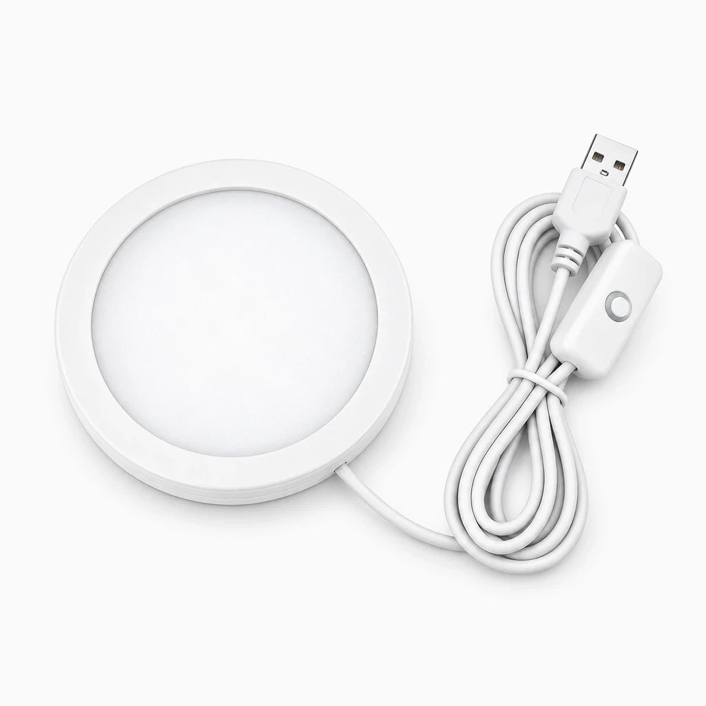 Petit luminaire rond blanc brillant, design minimaliste adapté à tout intérieur, équipé de LED à variation de couleur