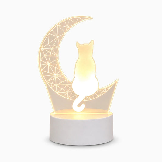 Veilleuse chat 3D blanc avec silhouette en relief projetant des ombres douces sur mur