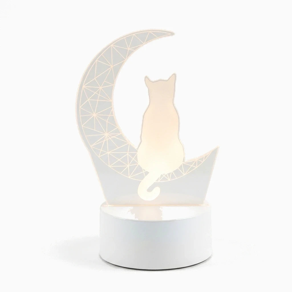 Veilleuse chat jaune compacte sur table de chevet émettant lumière chaude apaisante